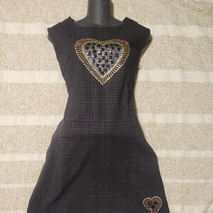Elegant Black Dress with Gold Heart Detail